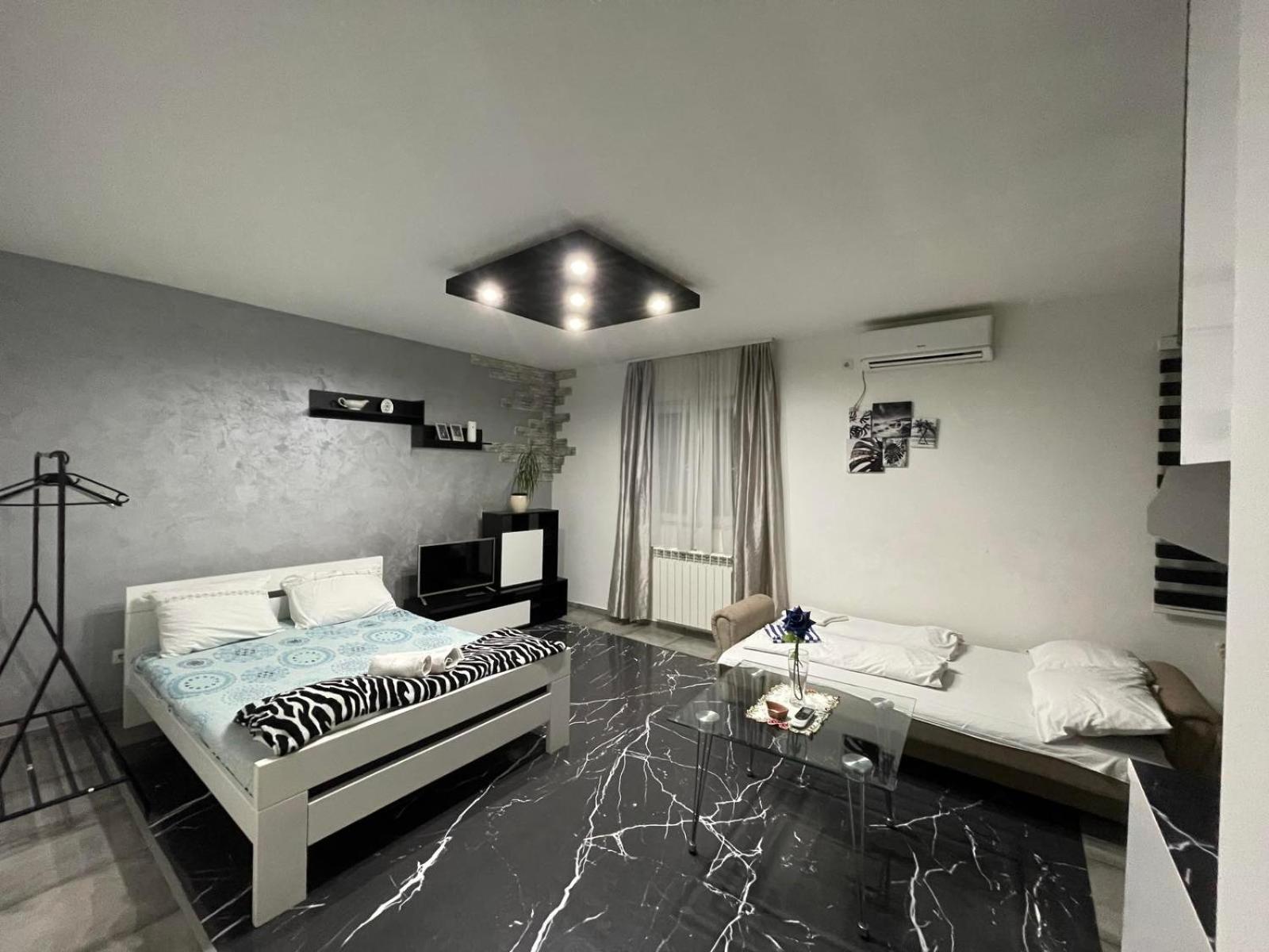 Airport Apartments Belgrado Habitación foto